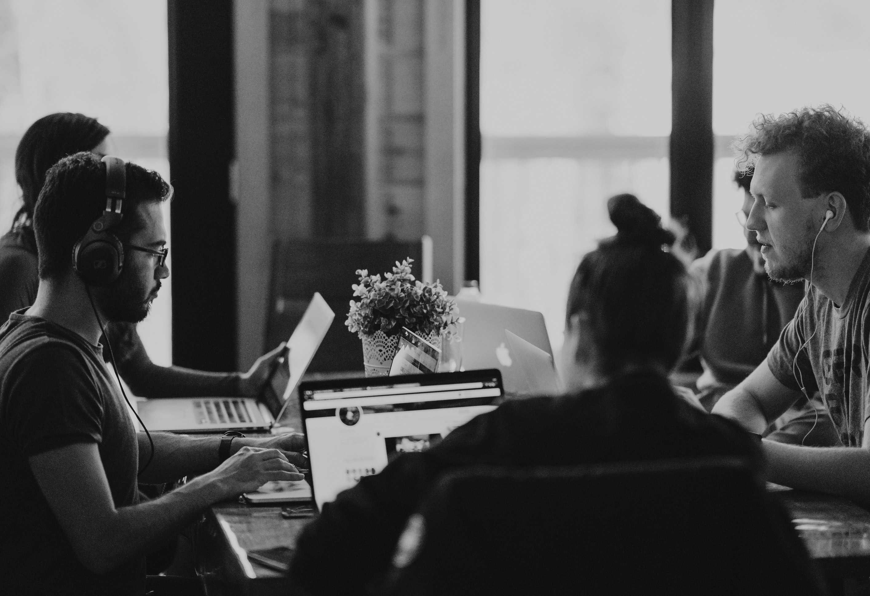 People meeting with computers